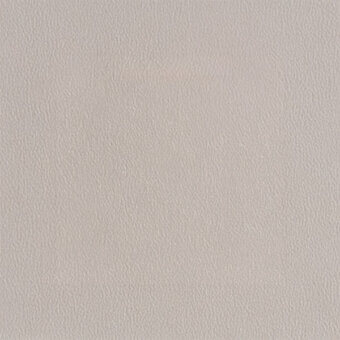 Light gray leather texture sample, egoitaliano carezza 502, exhibits a matte finish and subtly pebbled, irregular grain pattern.